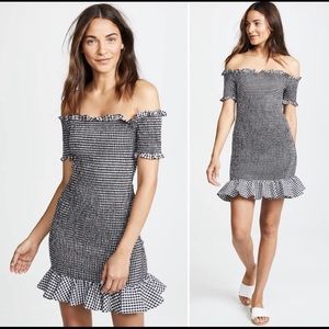 Very cute checkered fitted dress. Never worn.